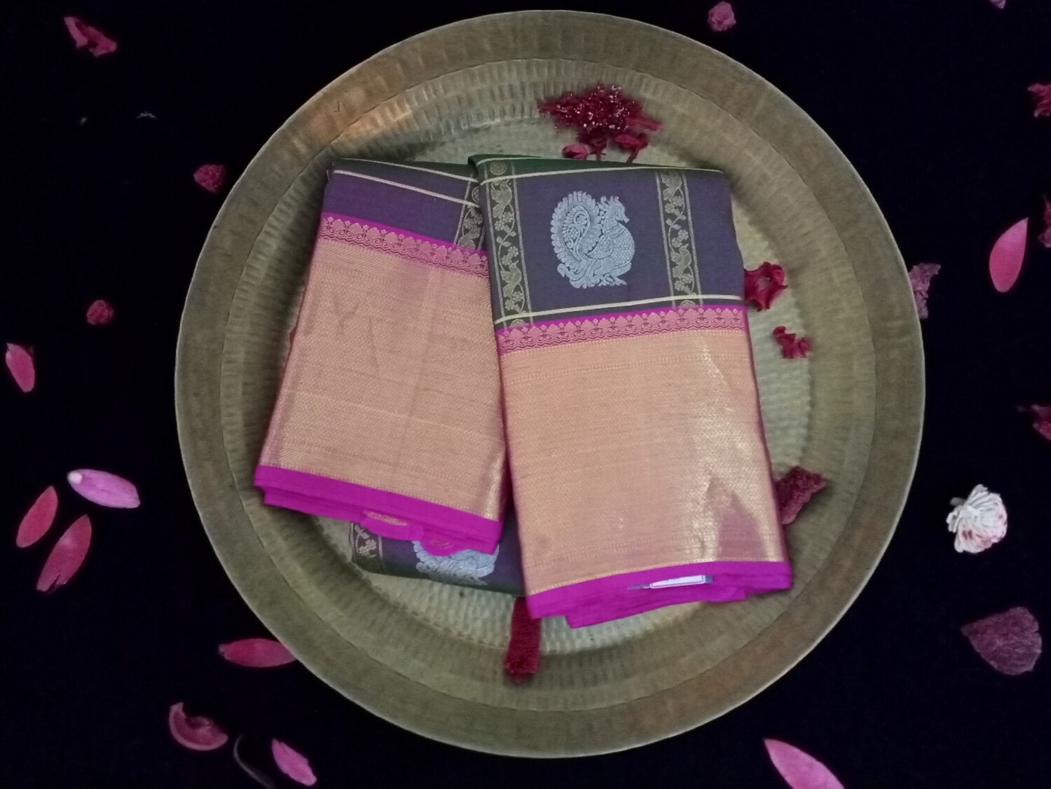 Olive green shade with orchid color kanchi saree comes along pink and gold border