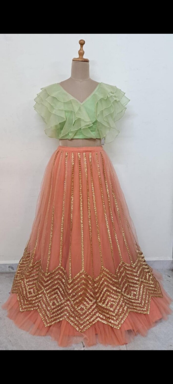 peach lehenga with orgenza frilled top