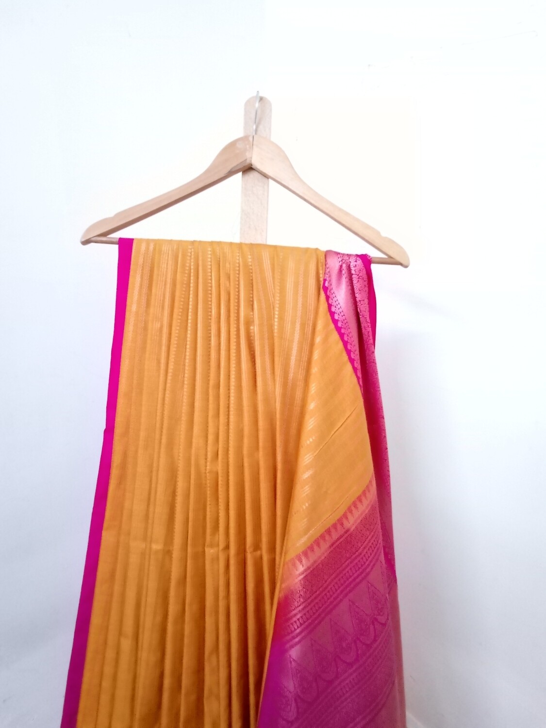 Yellow silk sari with pink border 