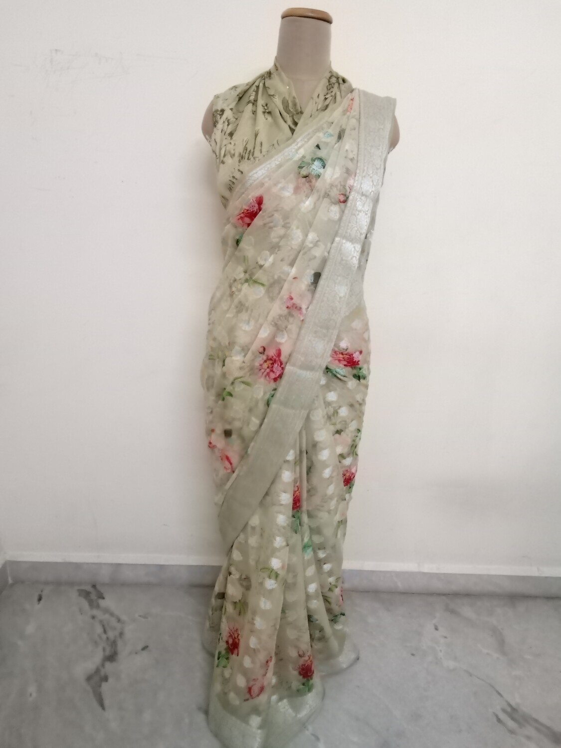 Pista green Georgette with silver zari border