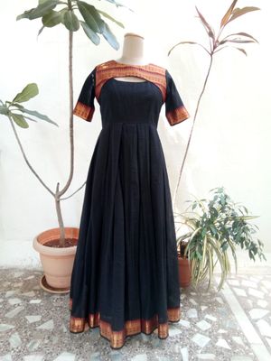 Black and brown silk crafted with border pattern.