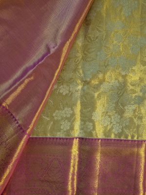 Luxurious Golden Brocade Saree with Maroon Border.