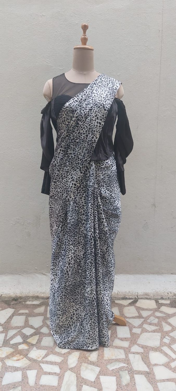Chic Leopard Print Saree with Black Off-Shoulder Blouse.