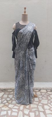 Chic Leopard Print Saree with Black Off-Shoulder Blouse.