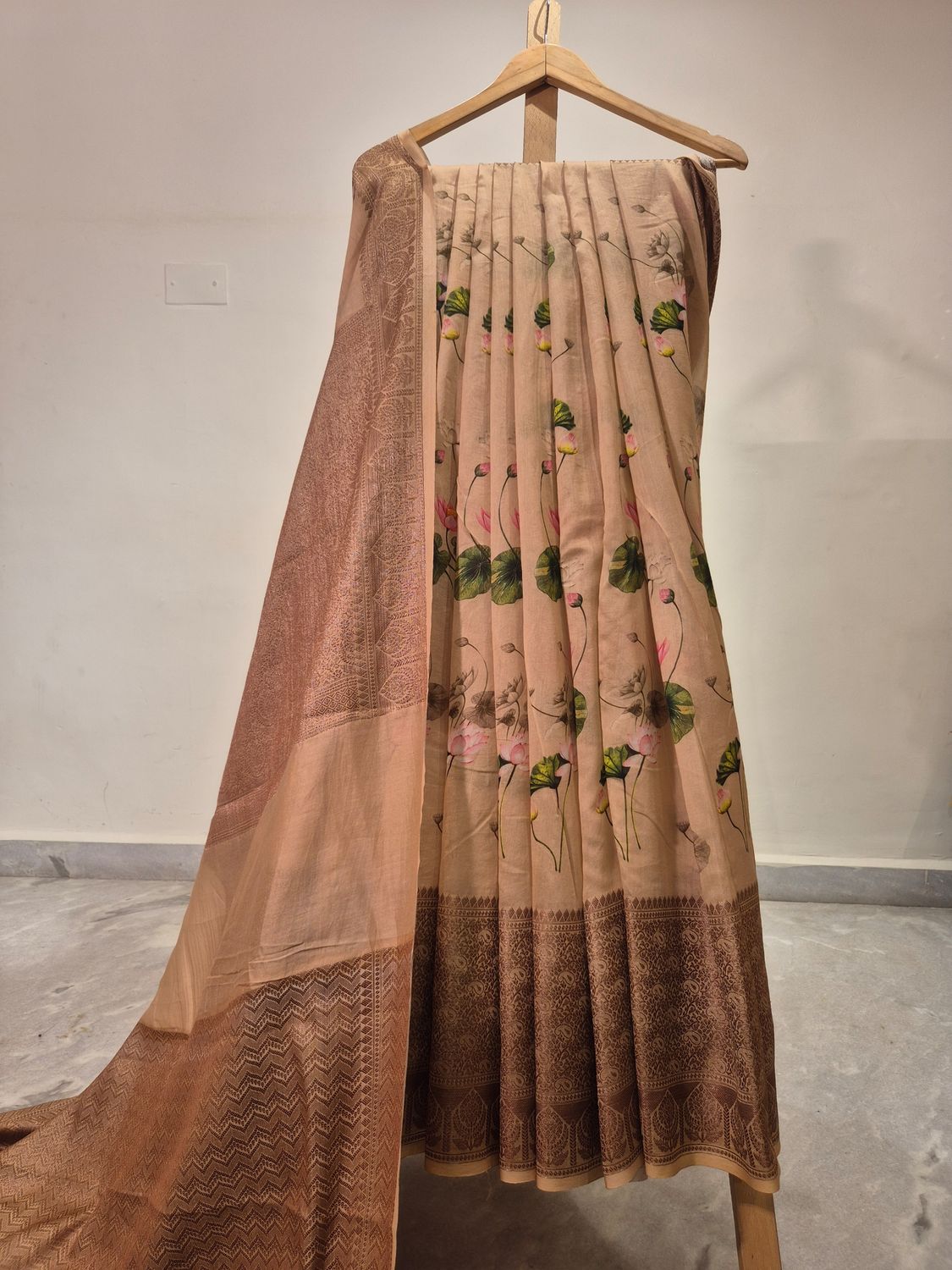  Beige Saree with Lotus Motif and Brown Border.