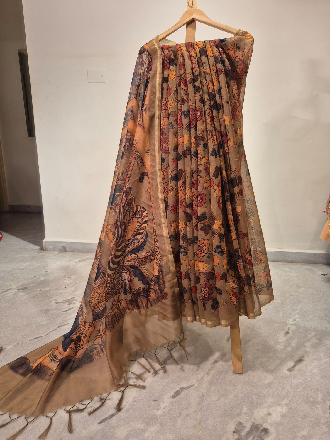 Handcrafted Traditional Saree with Intricate Floral and Artistic Motifs.