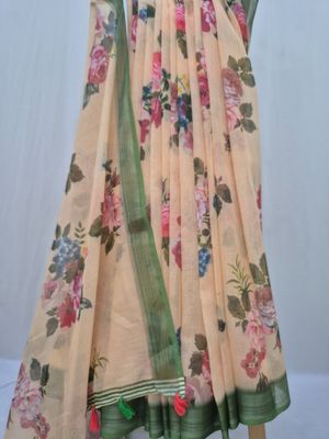  Pastel Floral Saree with Green Border and Tassel Detailing.