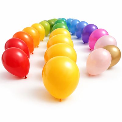 Colourful balloons arranged in curved rows on a white background fading into the distance