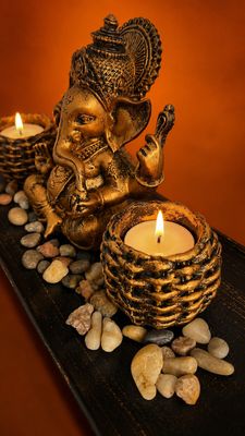Ganesh Ornament On A Wooden Stand With 2 x Ornamental Candle Holders