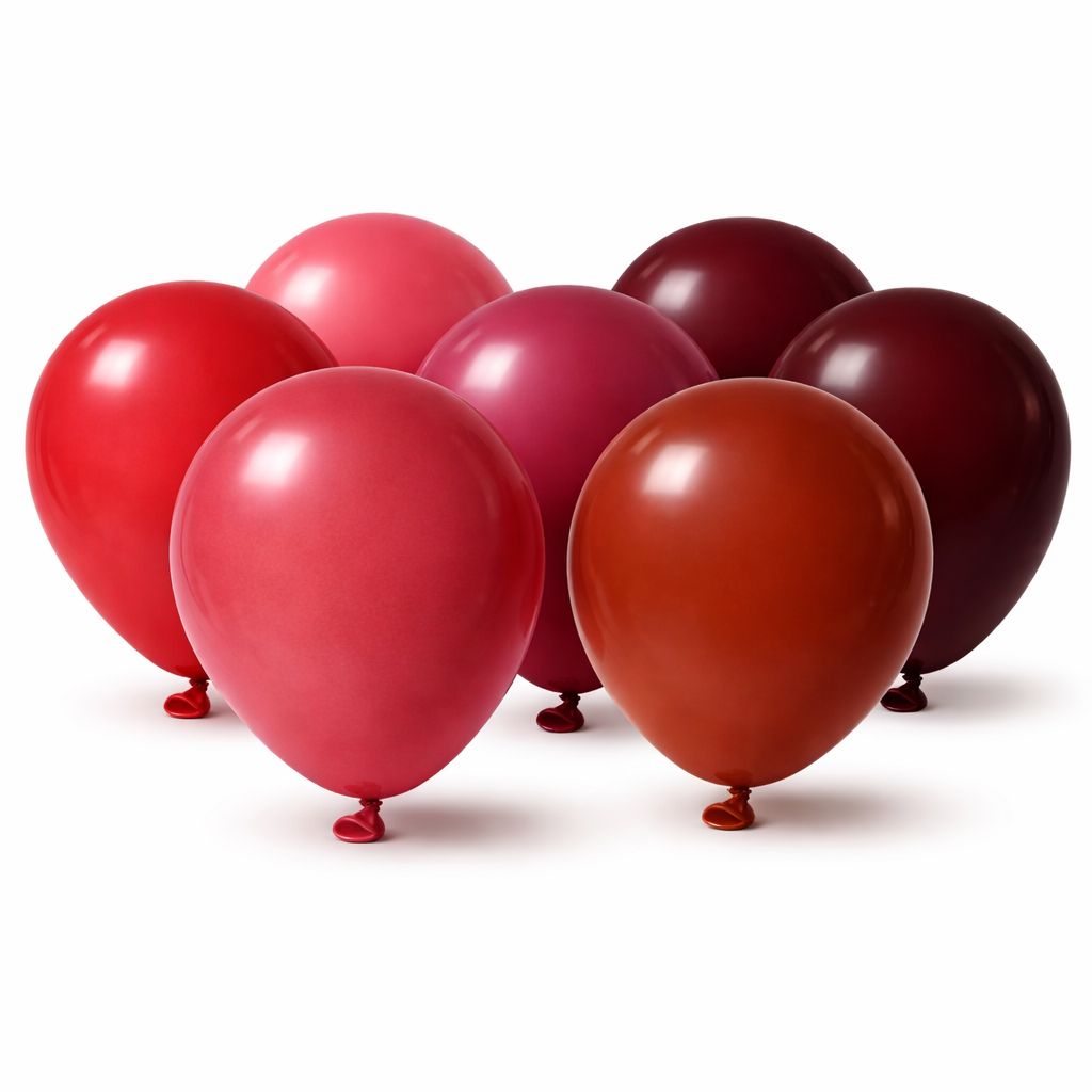 Six red balloons in varying shades arranged together on a white background showing colour range for balloon garlands