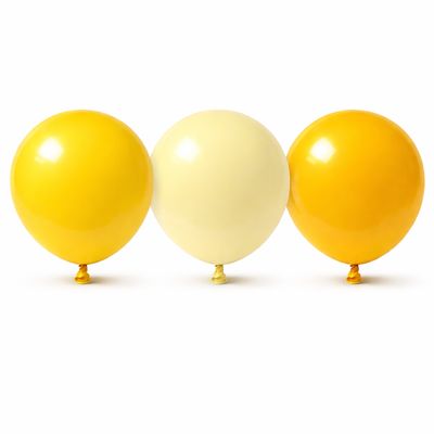 Three yellow balloons in classic, pastel, and golden shades aligned in a row on a white background