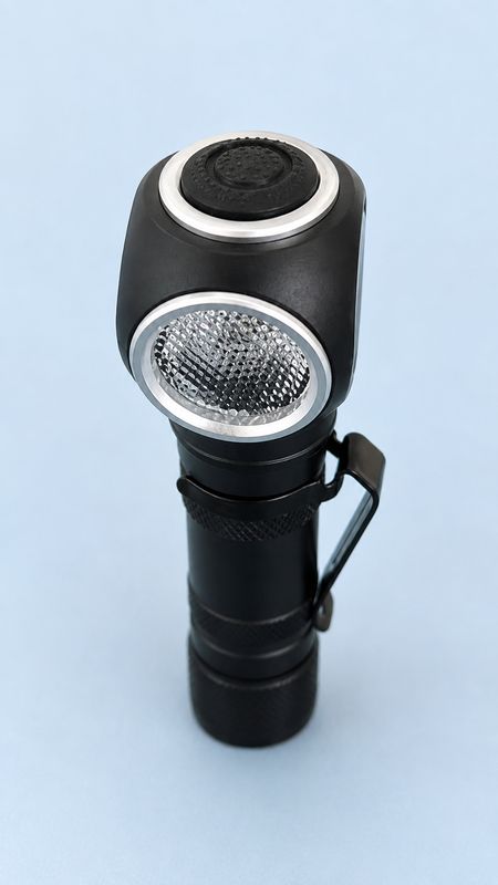 Rechargeable right-angle LED EDC torch with pocket clip, compact aluminium body and forward-facing work light.