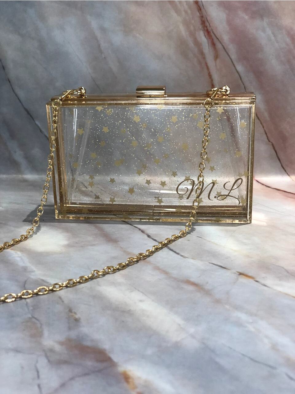 Cartera Acrílica Transarente Estrellitas con Dorado