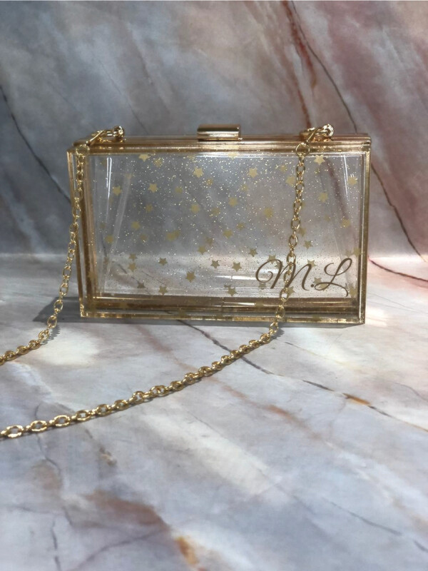 Cartera Acrílica Transarente Estrellitas con Dorado