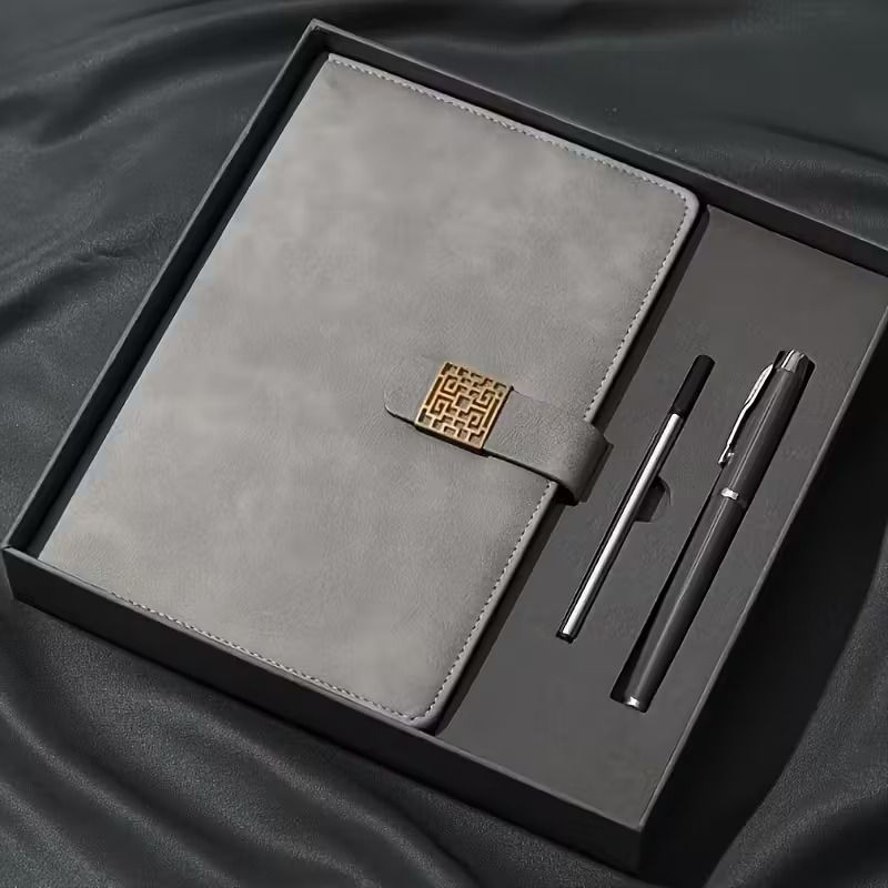 Set de libreta gris, boligrafo metalico y recargas en caja