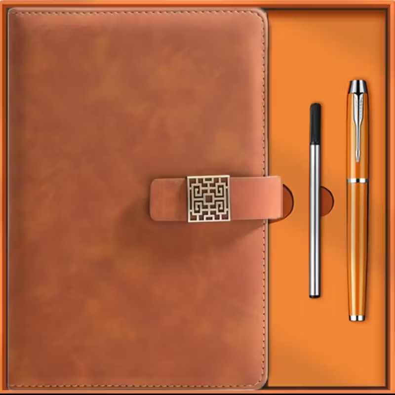 Set de libreta camel, boligrafo metalico y recargas en caja