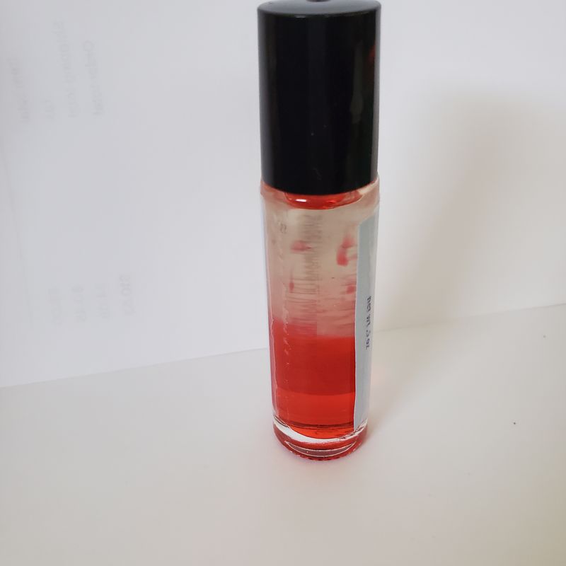 Lava lip gloss - strawberry sortbet