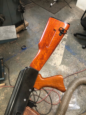 AKM Stock