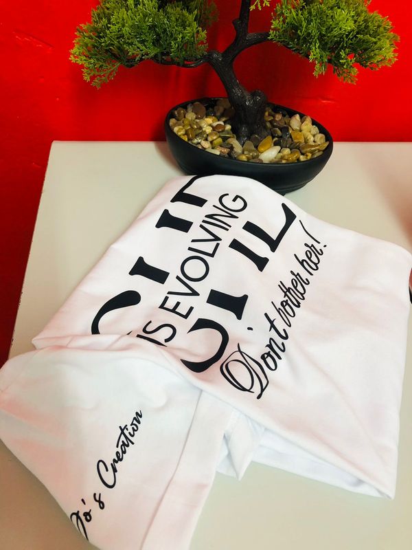 SHE IS EVOLVING TSHIRT