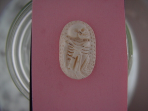 Carved Skeleton Button