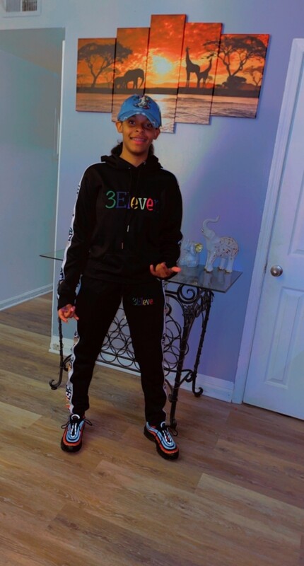 Black hooded sweatsuits