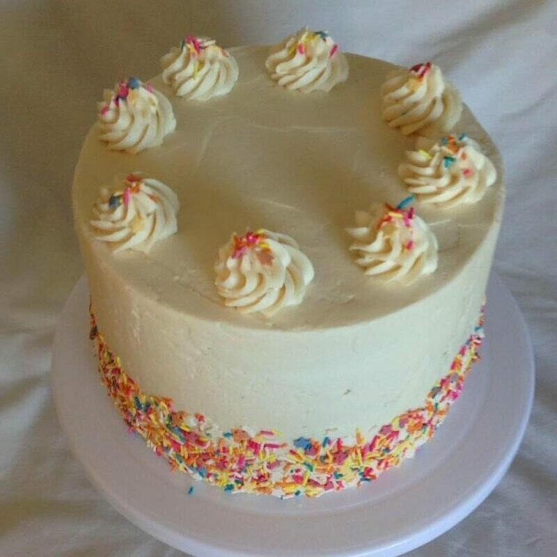 Buttercream cake with rainbow sprinkles