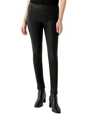 Pantalón de piel vegana con print metálico de pata de gallo.