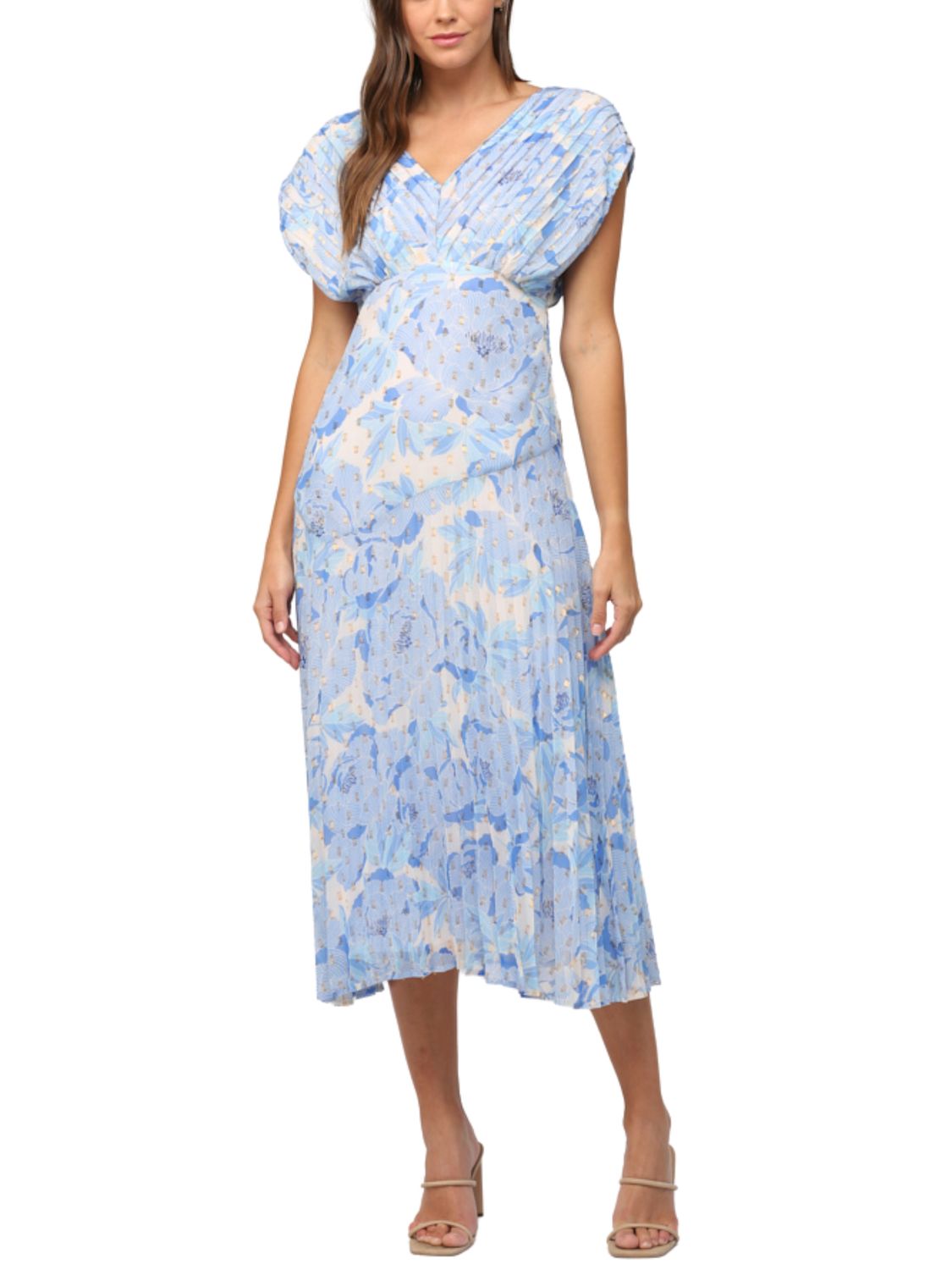 Vestido midi plisado con lunares dorados.