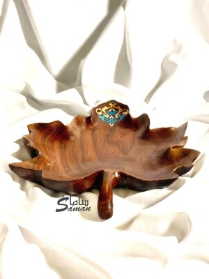 Hand-carved painted maple leaf