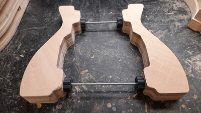 OM spreader clamps