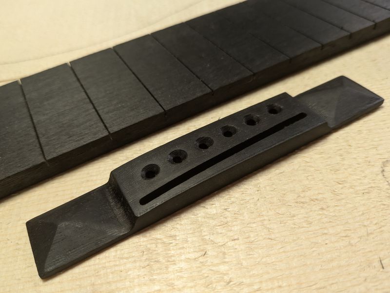 Royal Blackwood Finished Fretboard and Traditional Pyramid Bridge 826