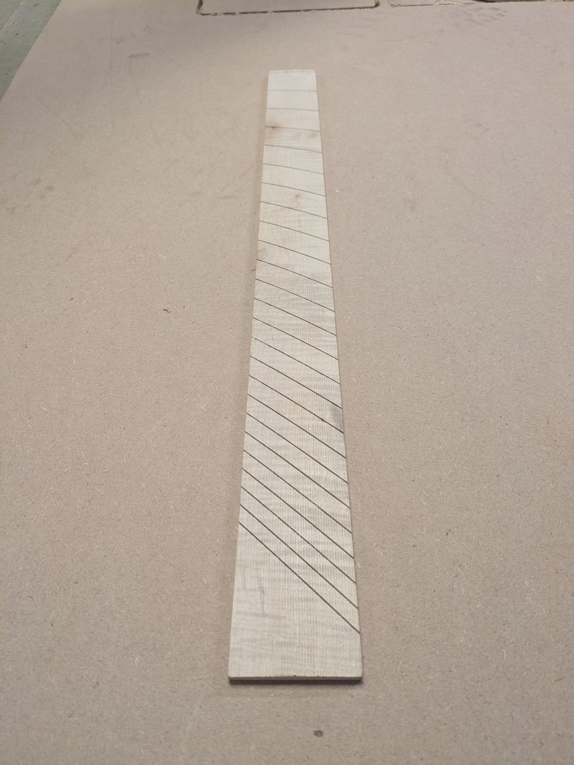 Finished Fan Fret Rippled Sycamore Fretboard 900