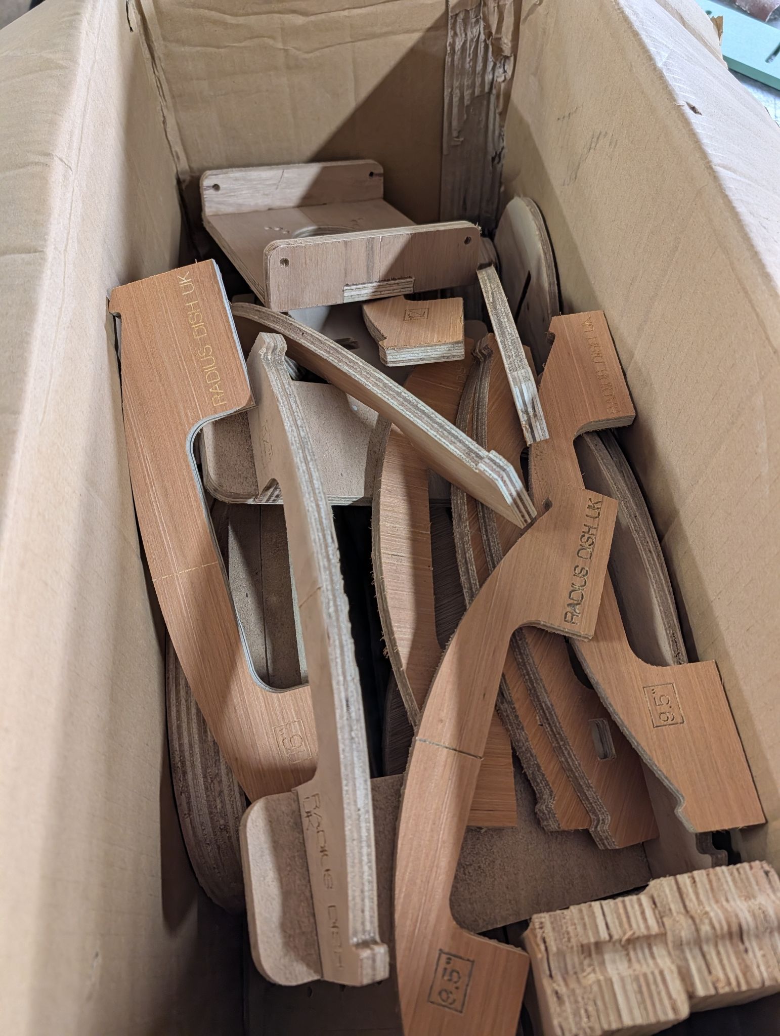 Box of various templates and luthier jigs