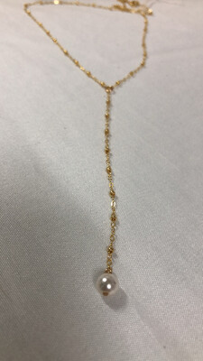Low Hanging Pearl Necklace