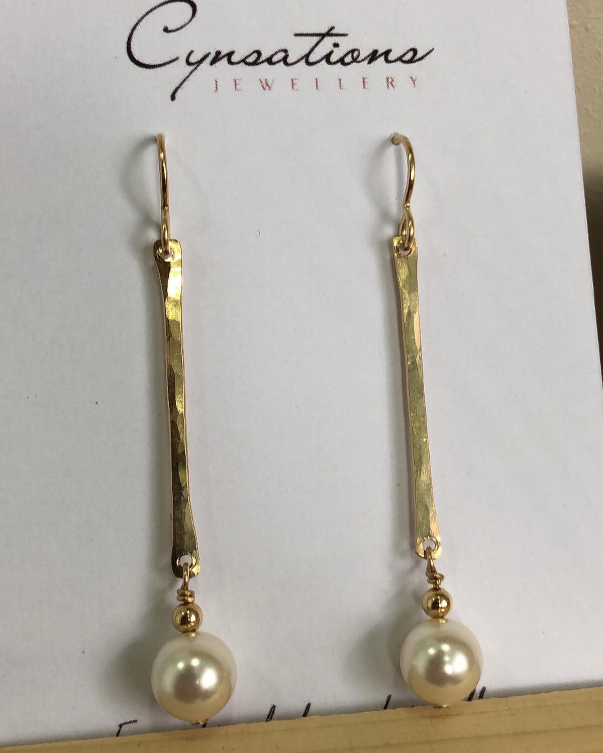 Hanging Pearls On A Stick