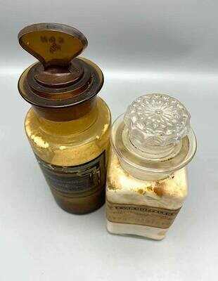 Set of two old authentic pharmacy bottles