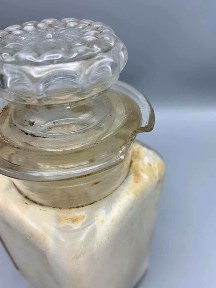 Set of two old authentic pharmacy bottles