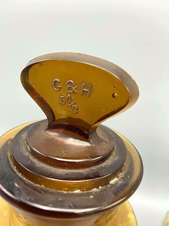 Set of two old authentic pharmacy bottles