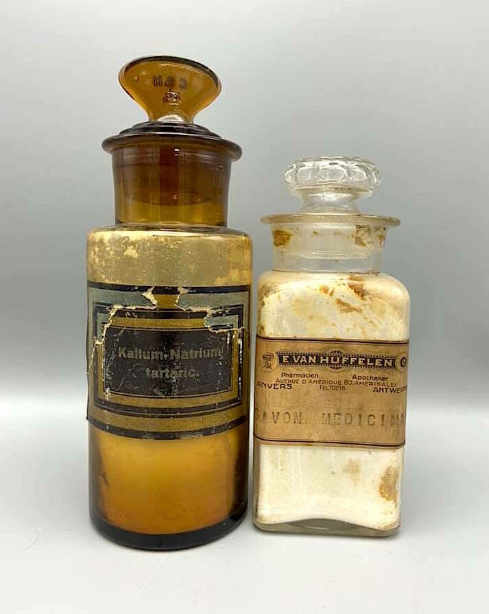 Set of two old authentic pharmacy bottles