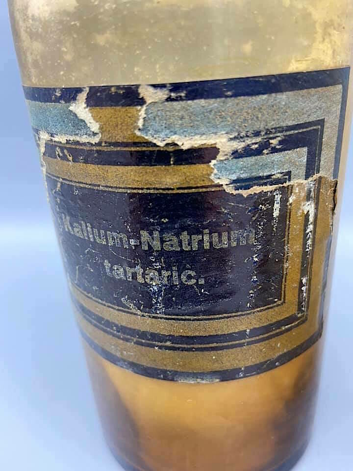 Set of two old authentic pharmacy bottles