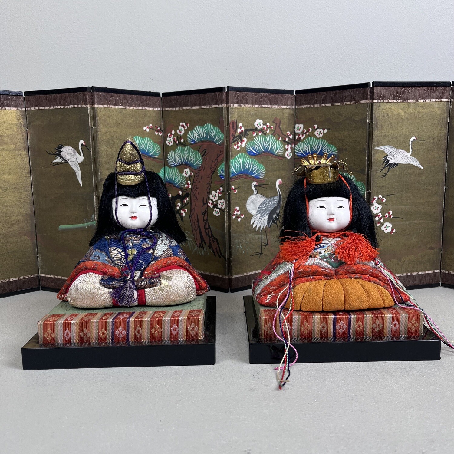 Japanese set of Hina dolls (雛人形) with Byōbu (folding screen) from the 1950s.