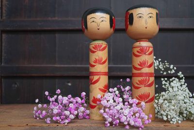 Set van 2 Vintage Traditionele Hijiori Kokeshi door Sato Minosuke (1905-1977), Japan.