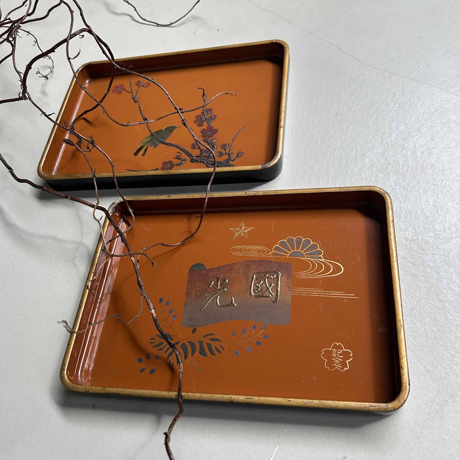 Set of two wooden lacquerware trays, Urushi-e, Meiji period, Japan.