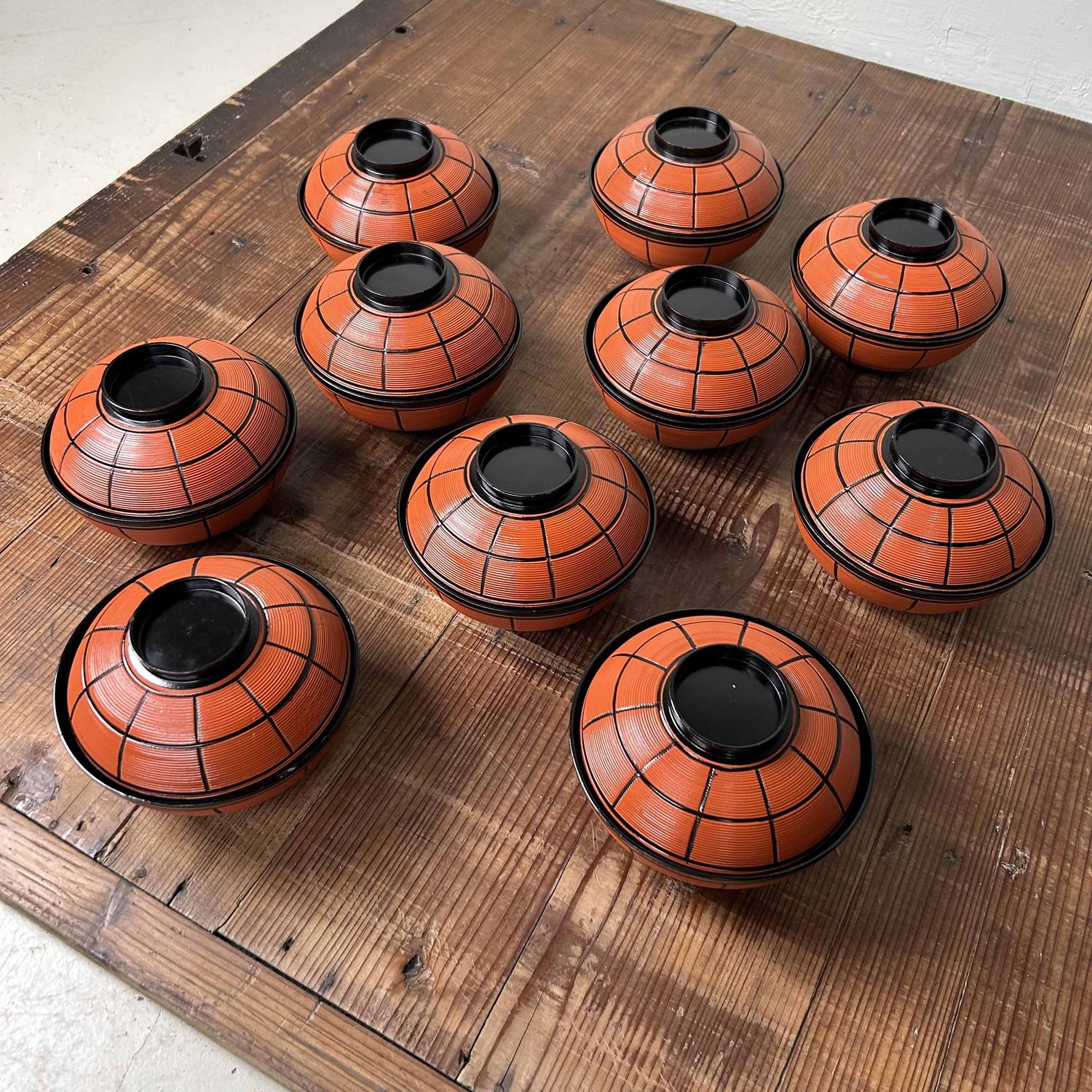 Authentic set of (10) lacquered wooden Nuri Owan serving bowls, Shōwa period, Japan.