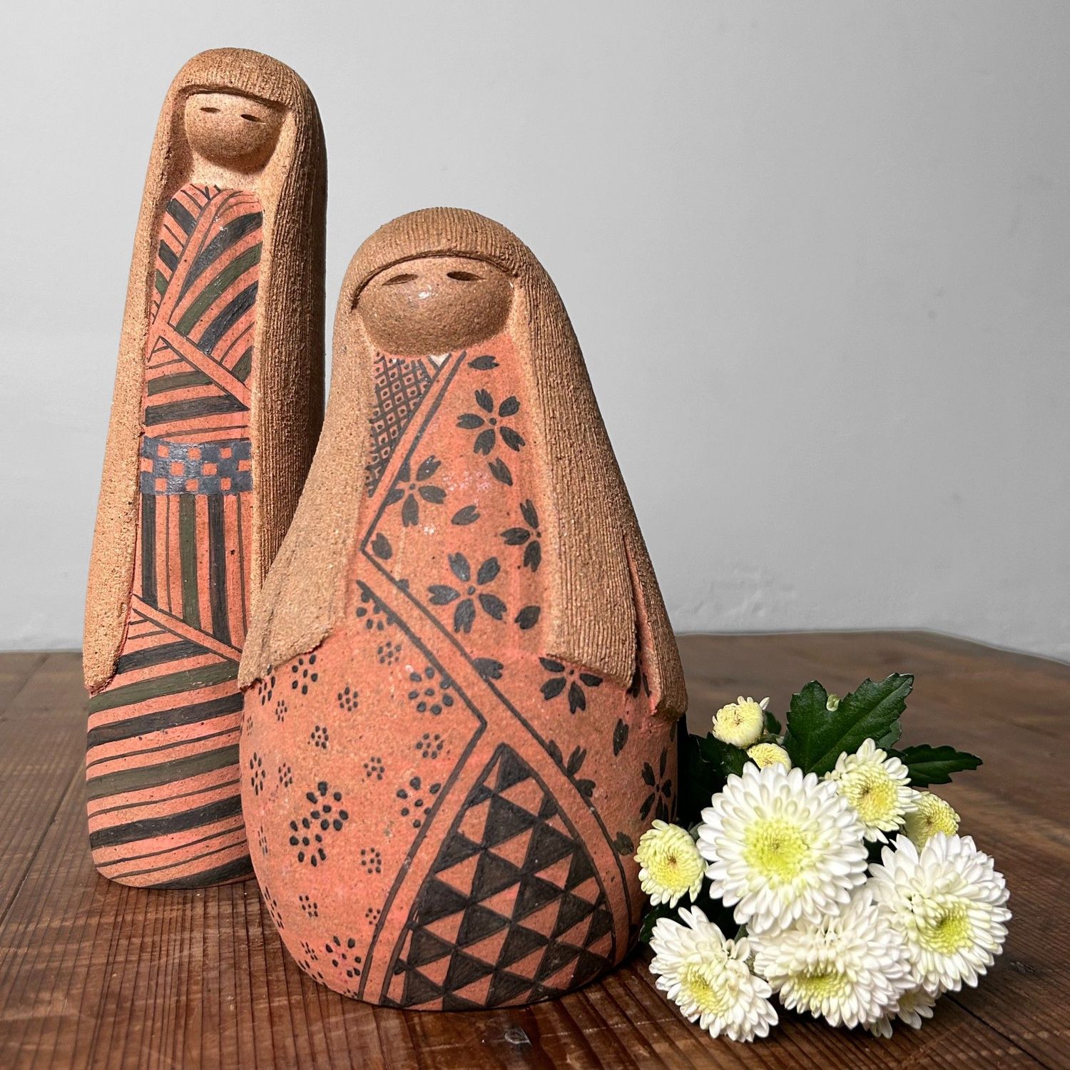 Rare Set of Terracotta Kokeshi, Shōwa Period, Japan.