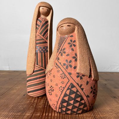 Rare Set of Terracotta Kokeshi, Shōwa Period, Japan.