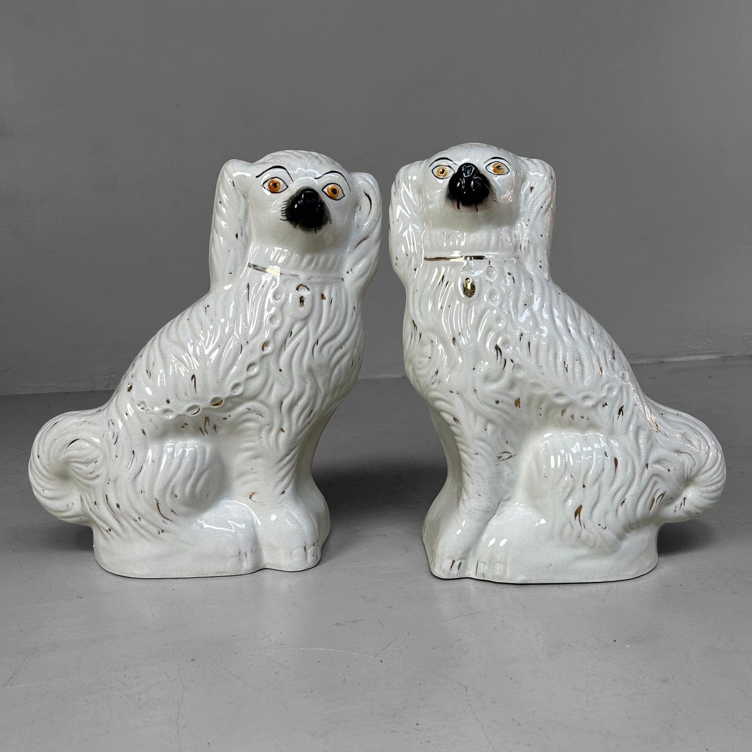 Pair of Early 20th Century Staffordshire Ceramic Dogs.