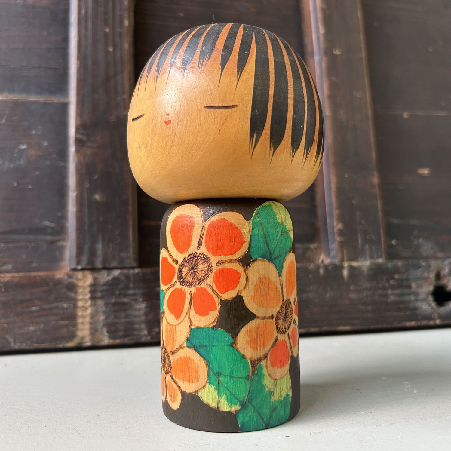 Collectible 1960s Kokeshi with Floral Motifs by Yuji Kawase