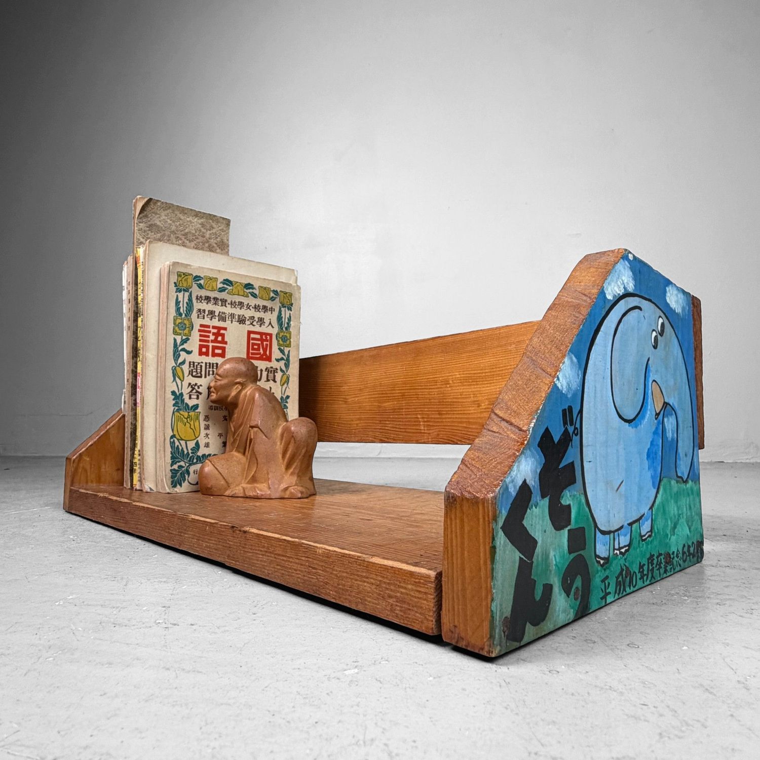 Vintage Wooden Book Rack with Children’s Paintings, Japan, 1990s. Vintage Wooden Book Rack with Children’s Paintings, Japan, 1990s.