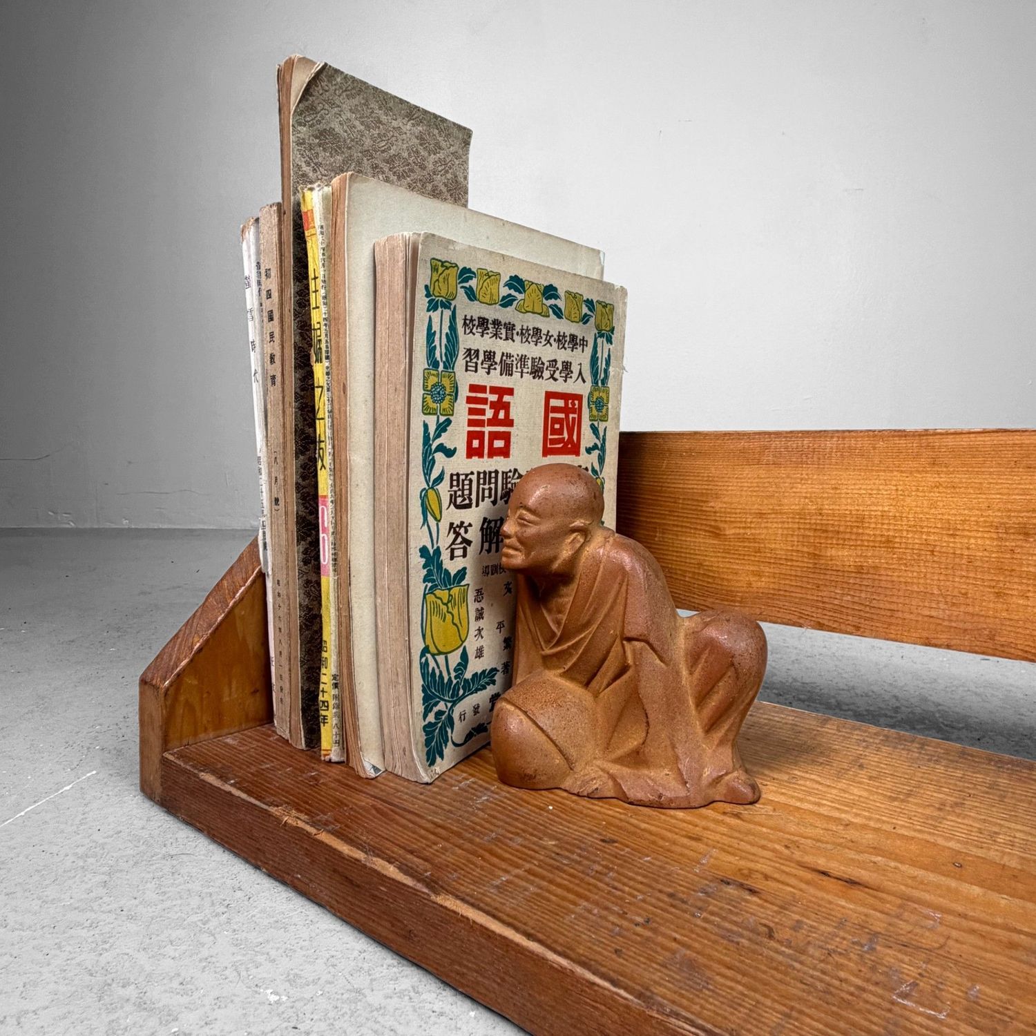 Vintage Wooden Book Rack with Children’s Paintings, Japan, 1990s. Vintage Wooden Book Rack with Children’s Paintings, Japan, 1990s.